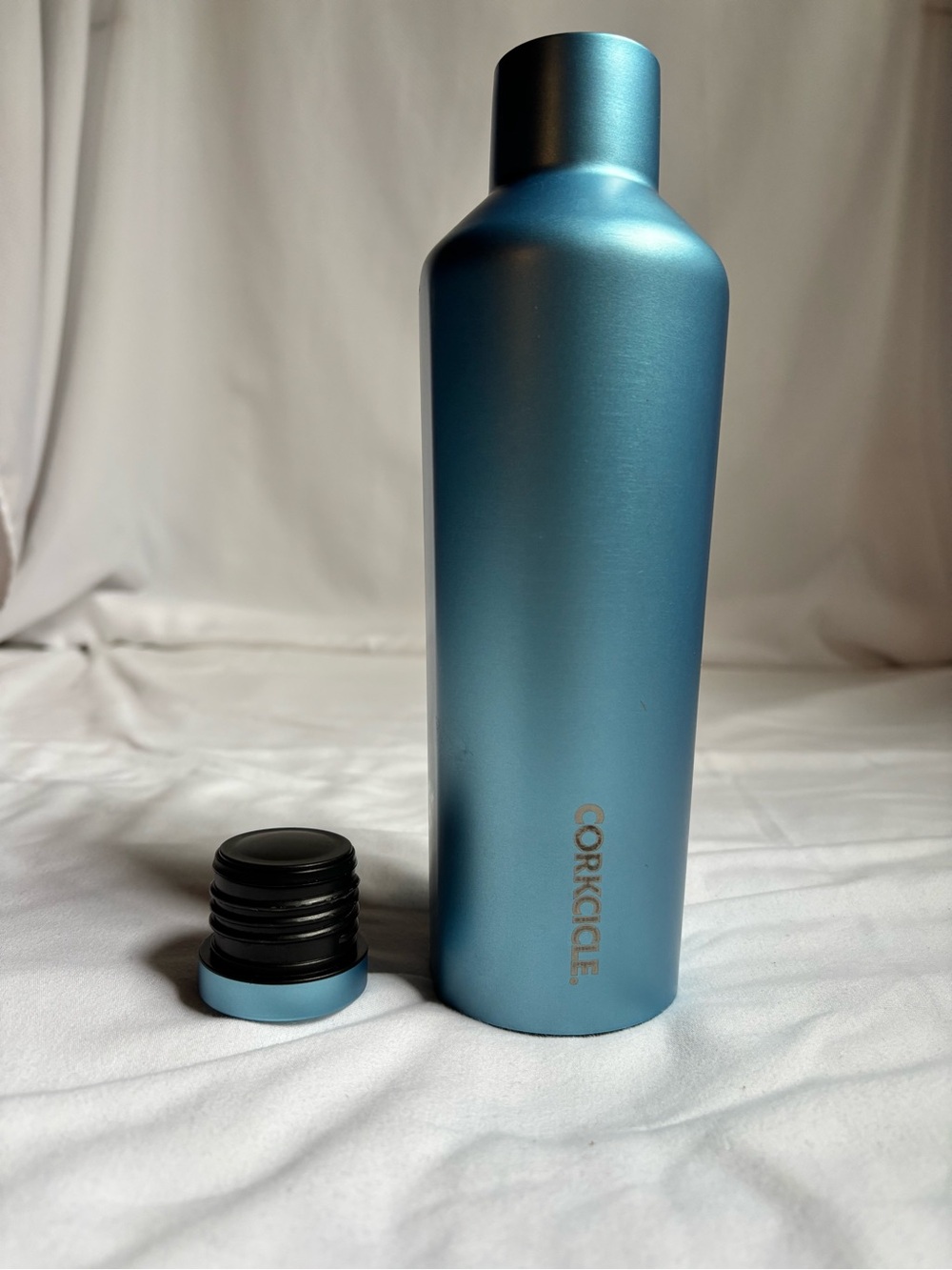 16oz Corkcicle Canteen insulated water bottle in a metallic blue finish.